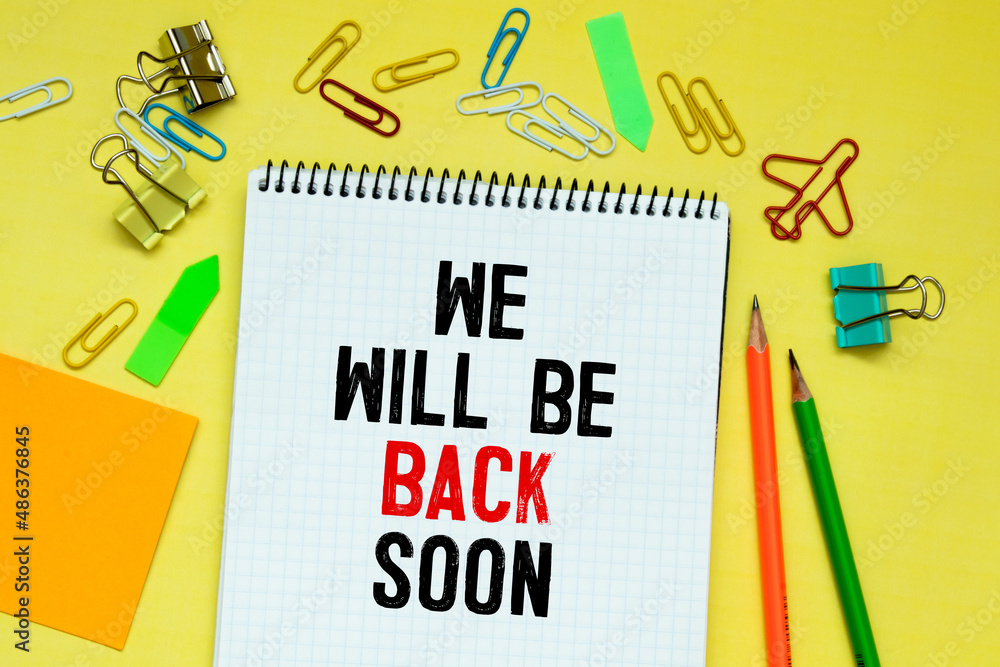 Poster we'll be back soon text on paper with calculator,magnifier ,pen on graph background