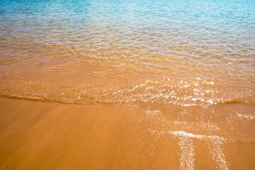 beach water ocean blue,background,yellow sand and blue water
