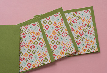 paper cards with florals on pink