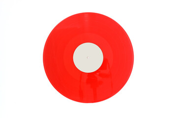 Fototapeta premium Red Vinyl record on a white background. Retro style. Top view. Flat lay, copy space. 
