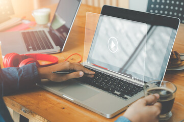 Video streaming on internet, Woman watching online movie or TV series on laptop computer, Concept...