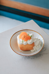 Orange cake and cream. Healthy Layered Orange Cake. Homemade bakery concept for birthday cake or valentine dessert.