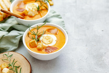 Vegan healthy food. Tomato soup or gazpacho on light  background. Copy space.