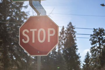 Stop sign on sunny day 