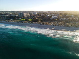 Fototapeta na wymiar Sunrise aerial flight above Scarborough beach in Perth, Western Australia