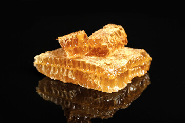 Honey comb on black background