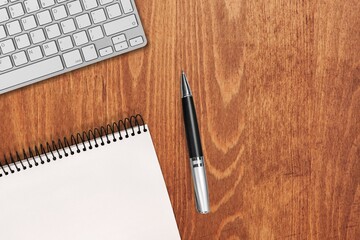 The 2022 desk calendar with pencil on office desk background.