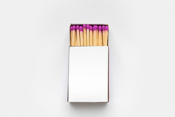 Box with new matchsticks on white background