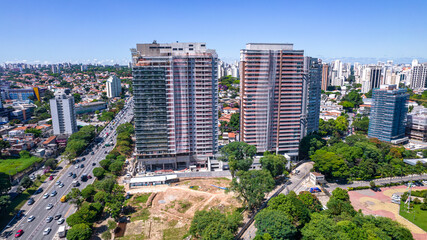 Fototapeta premium Aerial view of the city of São Paulo, Brazil. In the neighborhood of Vila Clementino, Jabaquara. Aerial drone photo. Avenida 23 de Maio in the background. Many residential buildings under construction