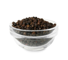 Bowl of black peppercorns on white background