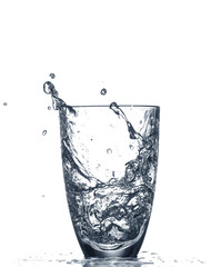 Glass of clear water with splash isolated on white