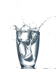 Glass of clear water with splash isolated on white