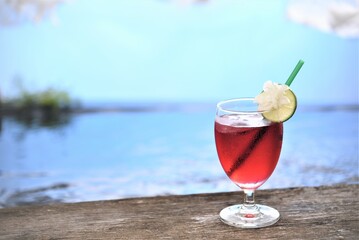 glass of cocktail on beach