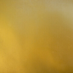Shiny yellow leaf gold foil texture background