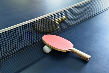 table racket and ball