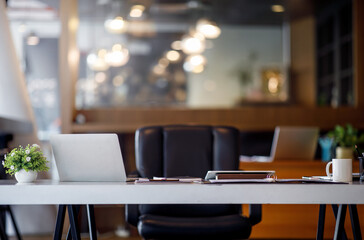 Design of workplace with laptop computer and cup of office