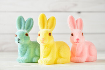 Cute Easter bunnies on light background
