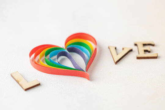 LGBT paper rainbow heart and letters LOVE. Valentines day concept