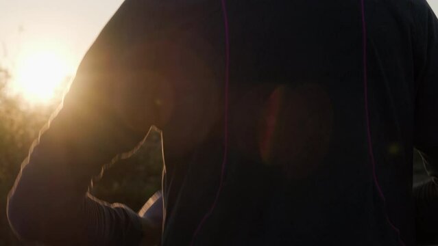 Healthy teenage boys running on the street for exercise. Young male athlete jogging outdoors. Healthy lifestyle concept