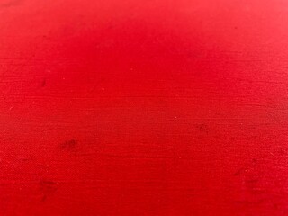 Top view of red background in full frame, dirty red cloth as background.