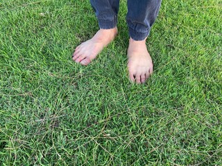 feet on grass with copy space for your work