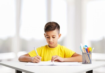 Creative smart student thinking about the future at home
