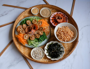 Chinese New Year must have dish. Seafood Yusheng aka Prosperity Toss with Abalone. Homemade Cantonese style 