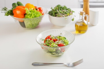 healthy vegetarian salad on white table