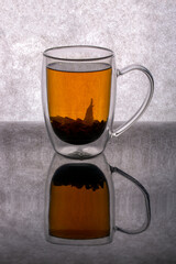 Cup with double walls with brewed tea