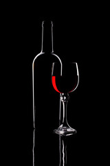 Still life with glass objects on a black background