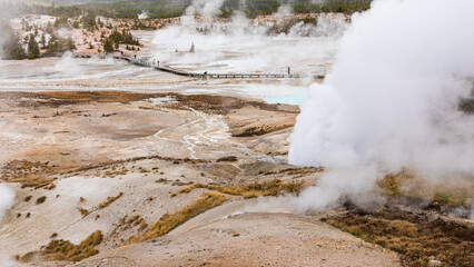Landscape of hot zone with smoke in Yellowstone.