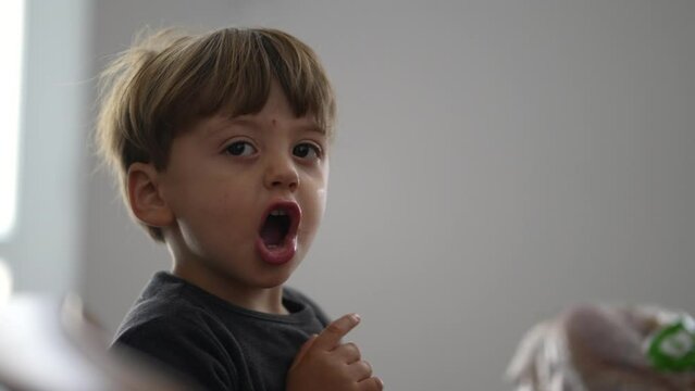 Upset angry little boy annoyed child