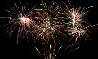 Festive colorful fireworks in the night sky
