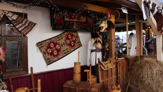 Souvenir Stall With Traditional Romanian Handicrafts And Costumes. Slide Shot