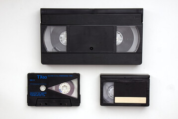 Vintage Media storage cassette tapes evolution: VHS, Audio Cassette Tape, VHS-C. Technology from...