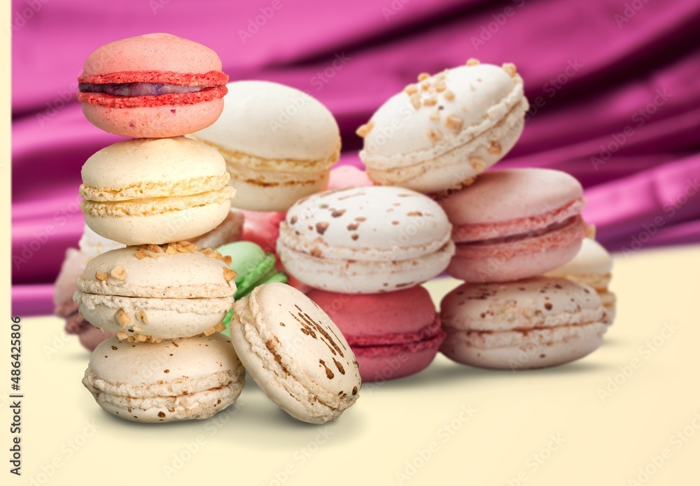 Wall mural Sweet colorful macarons. Tasty sweet macaroons, food concept