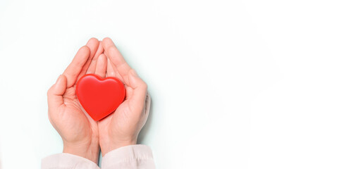 Red heart in Doctor 's hands on white background. Healthcare and hospital medical concept,organ donation concept.Symbolic of Valentine day.Heart day.?opy space.