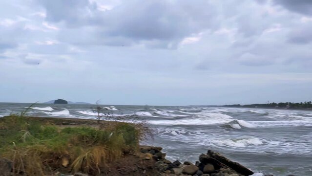 Waves rush to shore in Roxas City, Philippines.