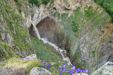 Kyzyl-su Waterfall surrounded by the Caucasus Mountains near Elbrus, Jily-su, Russia