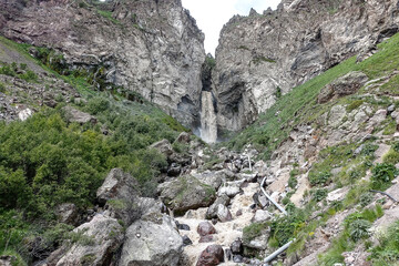 Fototapeta na wymiar Sultan-su Waterfall, surrounded by the Caucasus Mountains near Elbrus, Jily-su, Russia