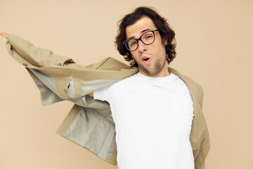 handsome man spectacled beige suit elegant style beige background