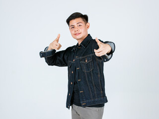 Portrait studio shot Asian young confident handsome cool short hair male hipster model wearing casual street wears denim jeans jacket standing crossed arms smiling look at camera on white background