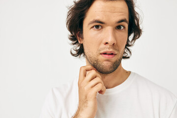 Fototapeta premium Attractive man in a white T-shirt hand gesture Lifestyle unaltered