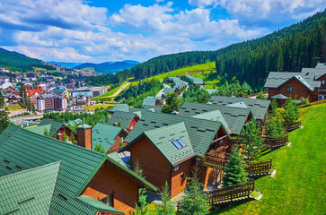 The mountain landscape with wooden houses, Bukovel, Carpathians, Ukraine