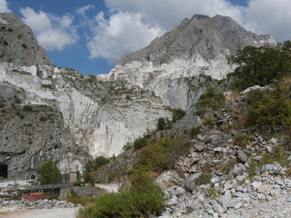 panorama of the Fantiscritti marble quarry with the mountain eroded by the extraction of the rock in the background