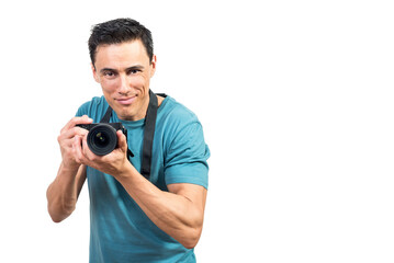 Cheerful photographer with camera smiling and taking photo