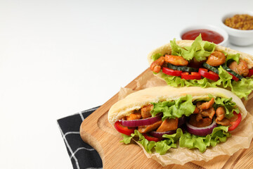 Concept of tasty food with pitas with chicken, space for text