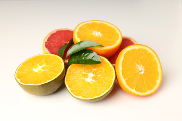 Naklejka na ściany i meble Concept of tasty food with citrus fruits on white background