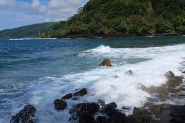 waves crashing on rocks