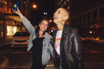 Two young city friends having fun at night © Jacob Lund